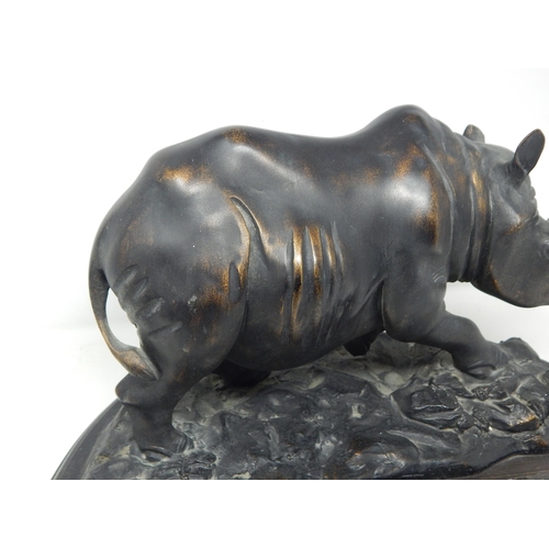 403 - Large Sculpture of a Rhinoceros on stand: Measuring 36cm wide