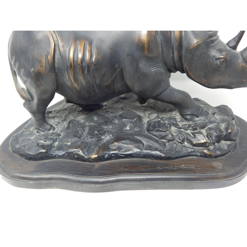 403 - Large Sculpture of a Rhinoceros on stand: Measuring 36cm wide