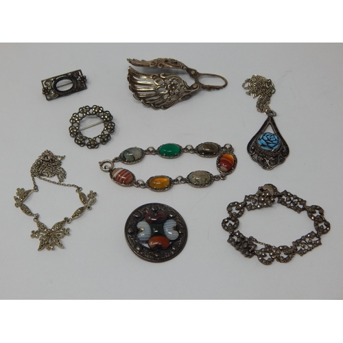 A Quantity of Vintage Silver Jewellery to Include a Celtic Hardstone Brooch, Bracelets, Pendant Necklaces etc.