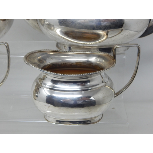 72 - 4 Piece Silver Plated Tea & Coffee Service Comprising: Coffee Pot, Tea Pot, Sugar Bowl & Milk Jug