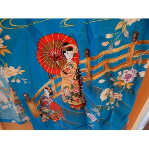 504 - Japanese Kimono with Scenes of Geisha Girls on Blue Ground.