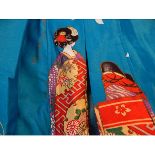 504 - Japanese Kimono with Scenes of Geisha Girls on Blue Ground.