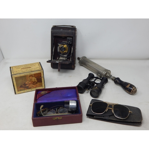 1930's Waifs & Strays Penny Box, Binoculars with Compass, Spray pump, Vintage Sunglasses, Camera & Cased Opticians Set (lot)