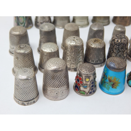 74 - A Collection of 23 Hallmarked Silver Thimbles Including examples by Charles Horner together with fur... 