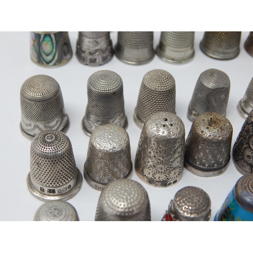 74 - A Collection of 23 Hallmarked Silver Thimbles Including examples by Charles Horner together with fur... 