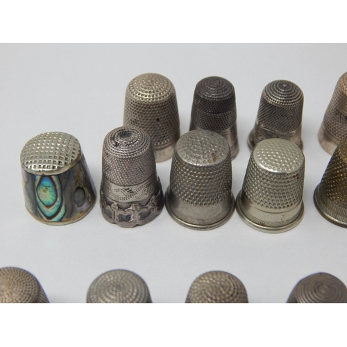 74 - A Collection of 23 Hallmarked Silver Thimbles Including examples by Charles Horner together with fur... 