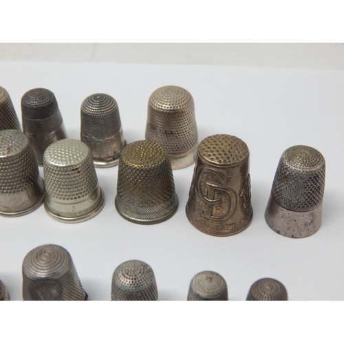 74 - A Collection of 23 Hallmarked Silver Thimbles Including examples by Charles Horner together with fur... 