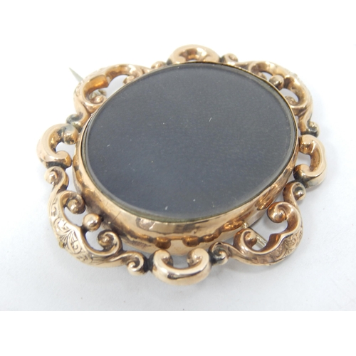 77 - A Large Victorian Gold Framed Double Sided Mourning Brooch: 5.5cm x 4.5cm: Gross weight 20.24g