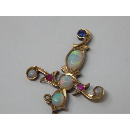 80 - Victorian 15ct Gold Lapel Pin Formed as a Sword & Set with Opals, Rubies & a Sapphire: 6.5cm