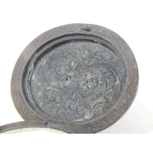 82 - Victorian Jet Mourning Locket containing a picture of a WWI soldier. 4.6cm x 4cm