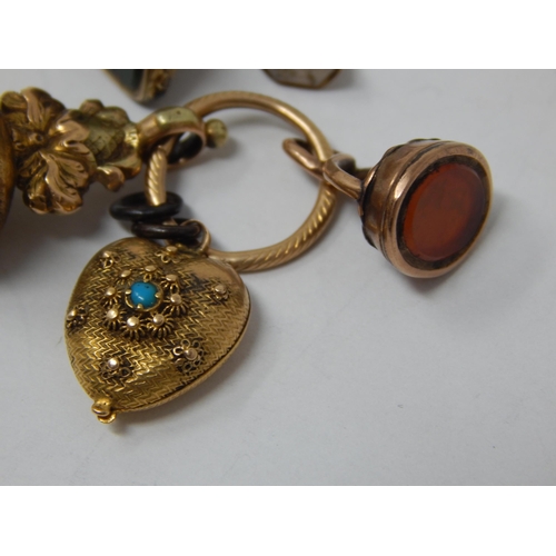 84 - Four Victorian Yellow Metal Fob Seals together with a Turquoise set locket.