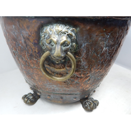 487 - Large Antique Copper Log Bin with Lion Mask ring Handles Sitting on Four Paw Feet: Measures 44cm dia... 