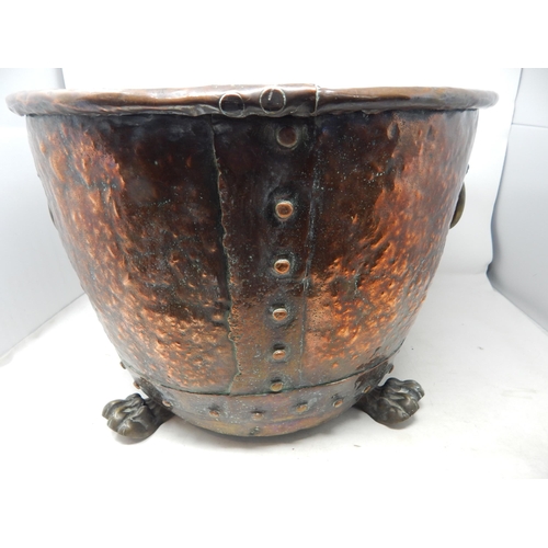 487 - Large Antique Copper Log Bin with Lion Mask ring Handles Sitting on Four Paw Feet: Measures 44cm dia... 