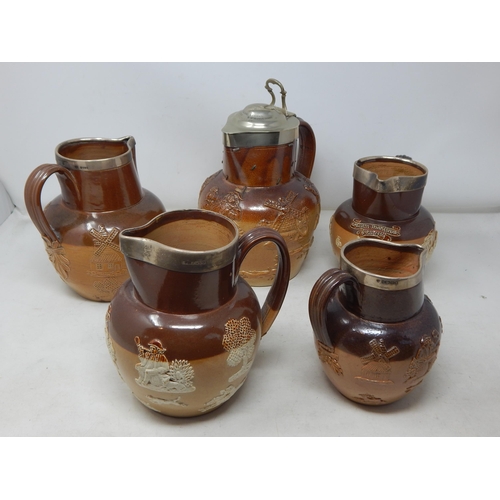 500 - A Collection of Hallmarked Silver Mounted Doulton Lambeth Stoneware Jugs together with a White Metal... 