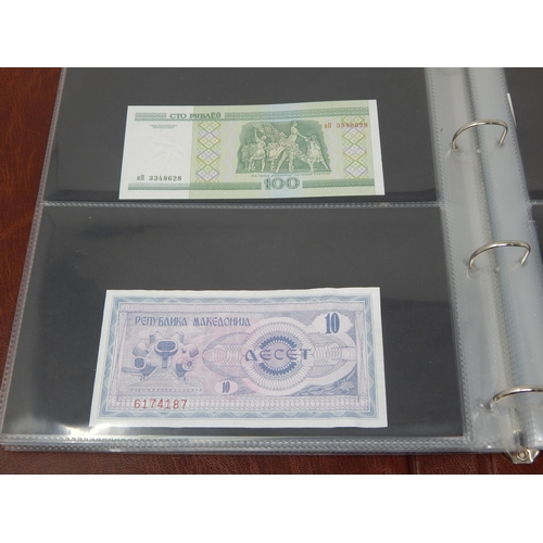 3 - A large collection of high grade GB and World Banknotes housed in collectors album