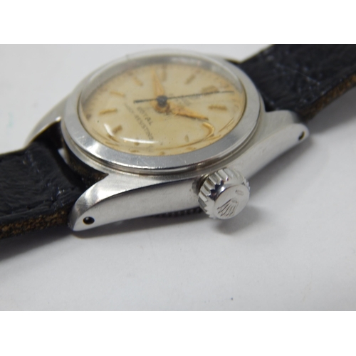 173 - TUDOR: Ladies Tudor Oyster Royal Wristwatch with sweep seconds hand on black leather strap: ticking ... 