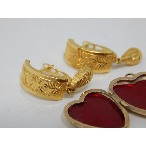 190 - A Pair of Gold Earrings marked 75% together with a 9ct Gold Double Sided Locket: Gross weight 3.29g