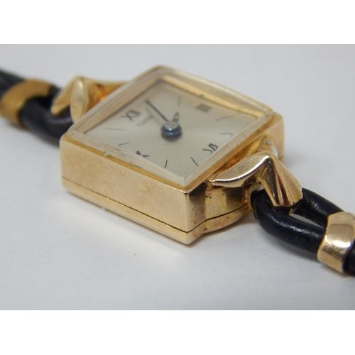 192 - TUDOR: 9ct Gold Ladies Tudor Wristwatch with Square Dial on Black Leather Strap & Original Guarantee... 