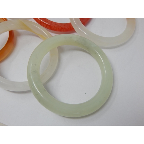 195 - A Quantity of Jade & Hardstone Bangles (8)