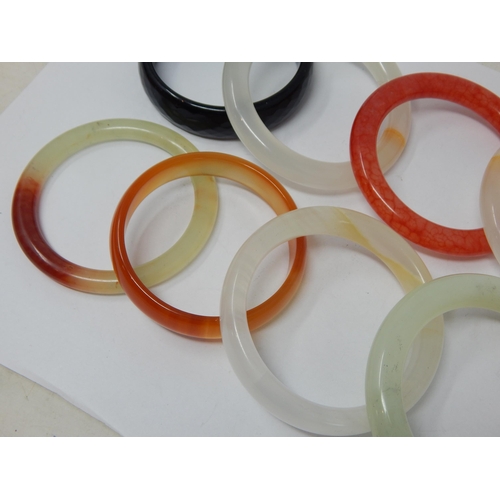 195 - A Quantity of Jade & Hardstone Bangles (8)