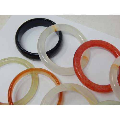 195 - A Quantity of Jade & Hardstone Bangles (8)