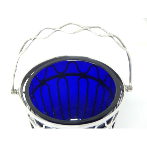 255 - Edwardian Swing Handle Silver Wirework Sugar Basket with Blue Glass Liner: Hallmarked Chester 1910 b... 