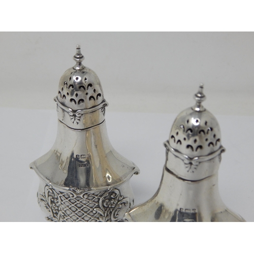 260 - A Pair of Edwardian Silver Pepperettes Hallmarked Birmingham 1904 by Fattorini & Sons: Weight 68g