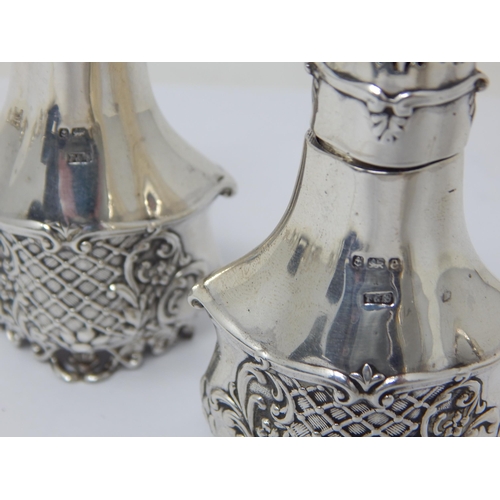 260 - A Pair of Edwardian Silver Pepperettes Hallmarked Birmingham 1904 by Fattorini & Sons: Weight 68g