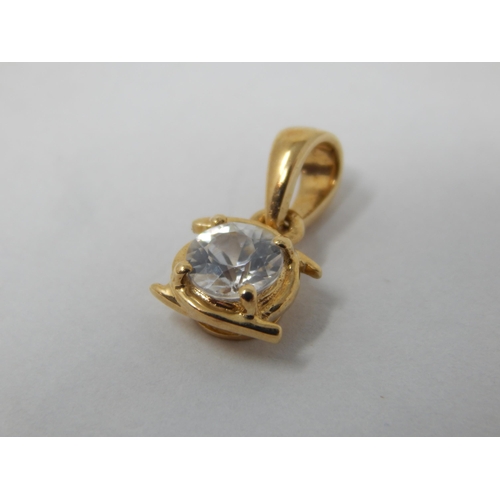 275 - 10ct Yellow Gold White Sapphire Pendant. The Sapphire Estimated @ 0.75cts