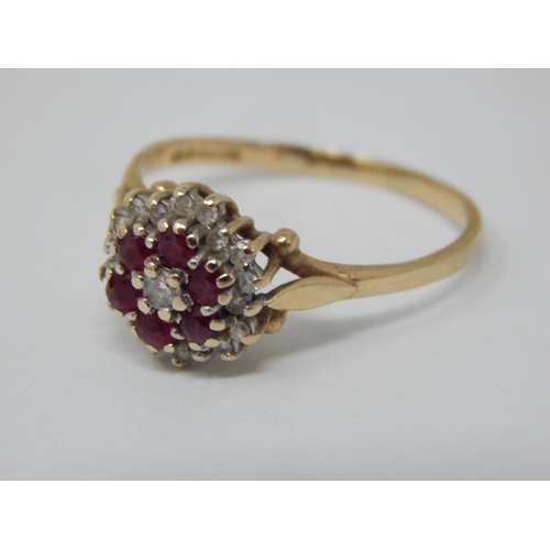 297 - 9ct Yellow Gold Ring Set with a Central Diamond within borders of Rubies & Diamonds: Size P/Q: Gross... 