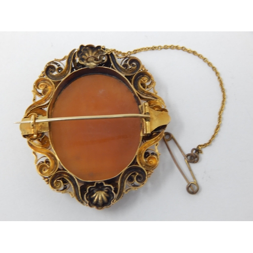 298 - Victorian Gold Framed Cameo Brooch Carved as The Three Graces with Safety Chain: Measures 5cm x 4cm