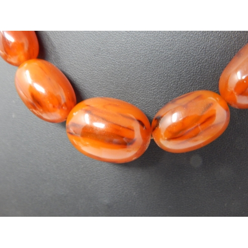 310 - Vintage Amber Necklace with Concealed Screw Thread Clasp: Measuring 48cm: Gross weight 56g