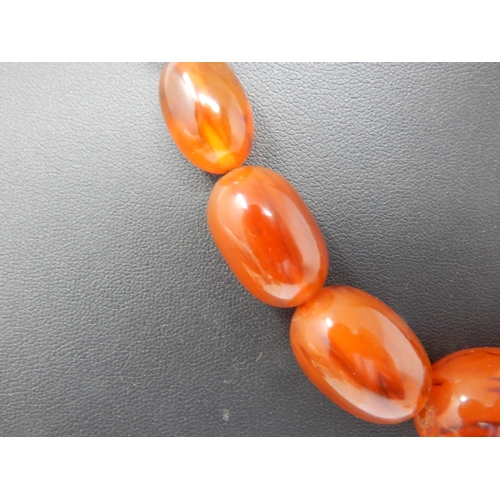 310 - Vintage Amber Necklace with Concealed Screw Thread Clasp: Measuring 48cm: Gross weight 56g