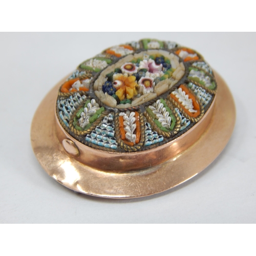 343 - Antique 9ct Gold Brooch set with an oval floral millefiori panel: Measuring 3.4cm x 2.6cm: Gross wei... 