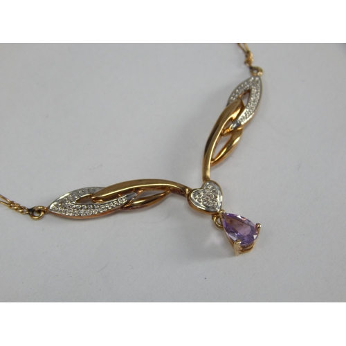 344 - 9ct Yellow Gold Pendant Necklace Set with Diamonds and an En Tremblant Amethyst: Length 40cm