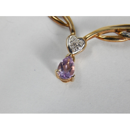 344 - 9ct Yellow Gold Pendant Necklace Set with Diamonds and an En Tremblant Amethyst: Length 40cm