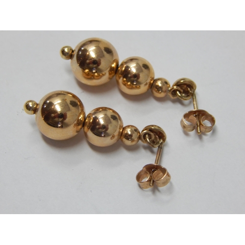 354 - A Pair of 9ct Yellow Gold Earrings Formed as Graduated Spheres: Weight 3.02g