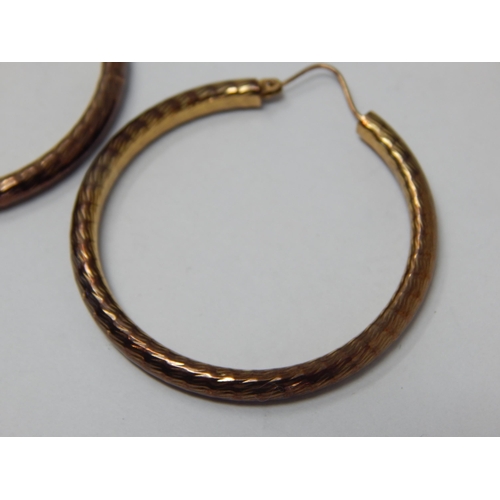 358 - A Large Pair of 9ct Yellow Gold hoop Earrings: Weight 7.65g