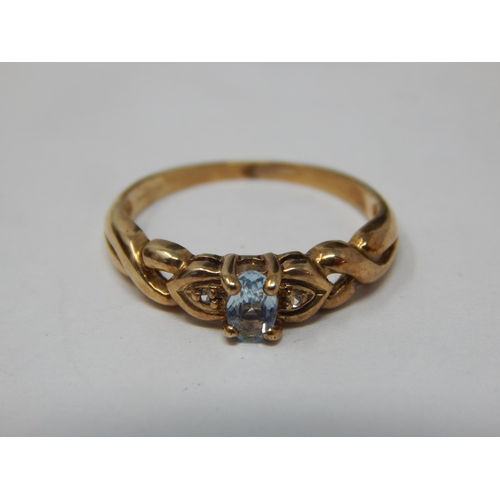 361 - 9ct Yellow Gold Ring Set with a Central Aquamarine: Size L