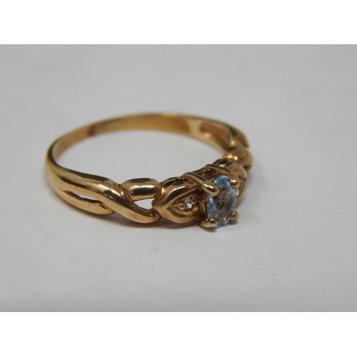 361 - 9ct Yellow Gold Ring Set with a Central Aquamarine: Size L