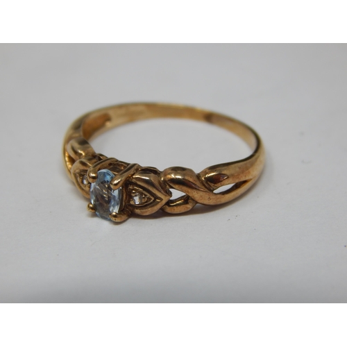 361 - 9ct Yellow Gold Ring Set with a Central Aquamarine: Size L