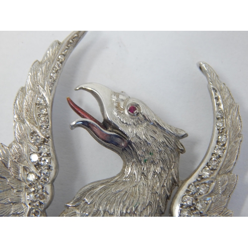 375 - 18ct White Gold Brooch Formed as a Phoenix Set with Diamond Encrusted Wings & a Ruby Eye: Measures 3... 