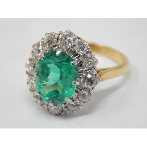 380 - 18ct Yellow Gold Ring Set with a Central Emerald Estimated @ 3.0cts within a border of Diamonds Esti... 