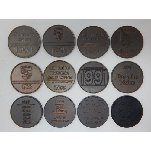 147 - A Collection of Bronze Porsche Medallions (Issued Yearly) with Models & Year Dates Between 1984 & 19... 