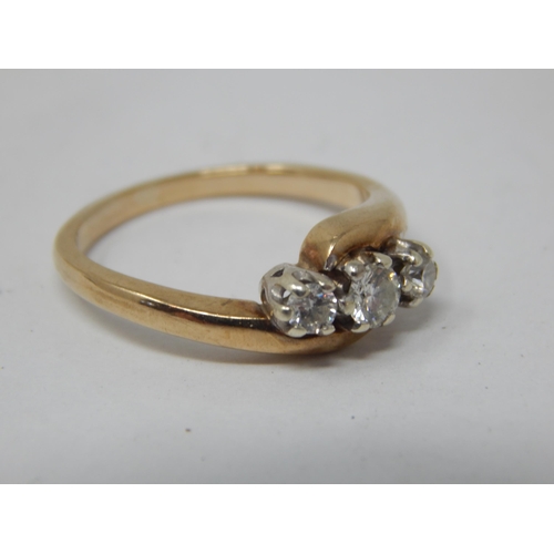 77 - Three stone diamond ring set in 9ct Gold shank