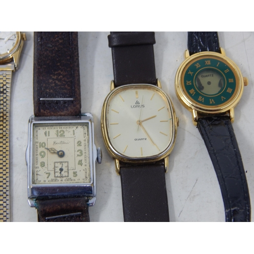 37 - A large collection of vintage wristwatches and a pocket watch and lighter