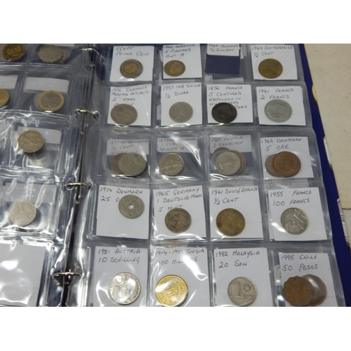 55 - A substantial collection of World coinage housed in 4 x Collectors albums including Silver coins (lo... 