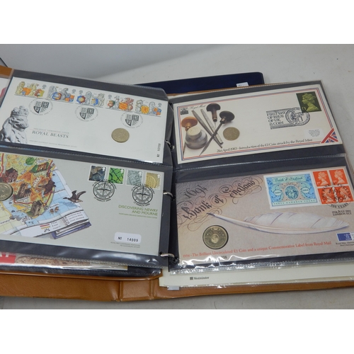 78 - a large quantity of Coin covers housed in two collectors albums (43 covers) twinned with a signed Si... 