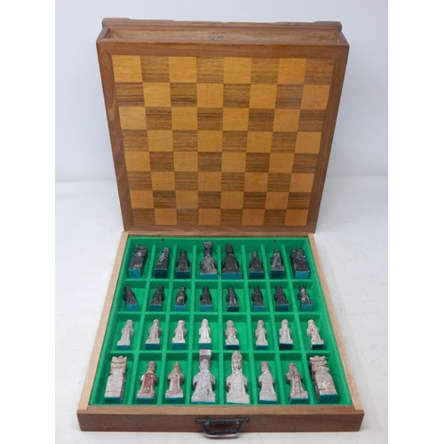 612 - Chess Set: The Pieces Carved from Soapstone & contained within a drawered chess board cabinet