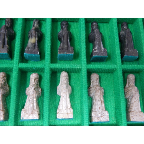 612 - Chess Set: The Pieces Carved from Soapstone & contained within a drawered chess board cabinet